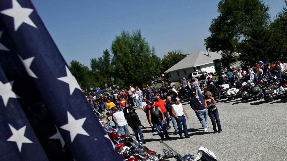 Motorcycles and people line the Main street of Cassoday in 2007.  Bikers have a tradition of riding to meet in Cassoday on the first Sunday of every month.