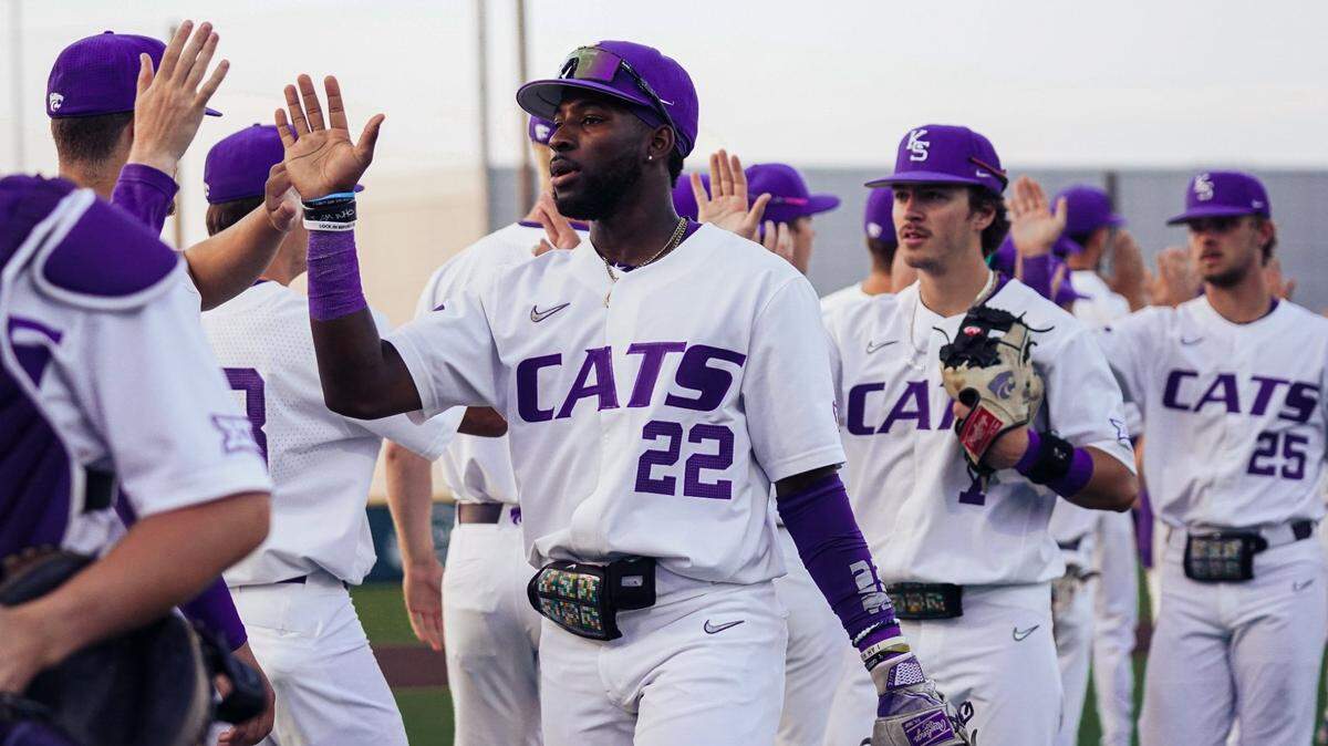 Kansas State baseball player Kaelen Culpepper and his teammates celebrate a victory at Tointon Family Stadium.