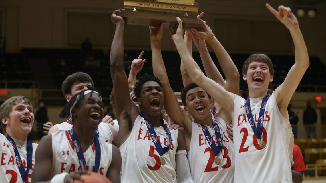 The Maize boys basketball team celebrates its first state championship in program history after topping Topeka West in the Class 5A championship game in Emporia on Saturday.