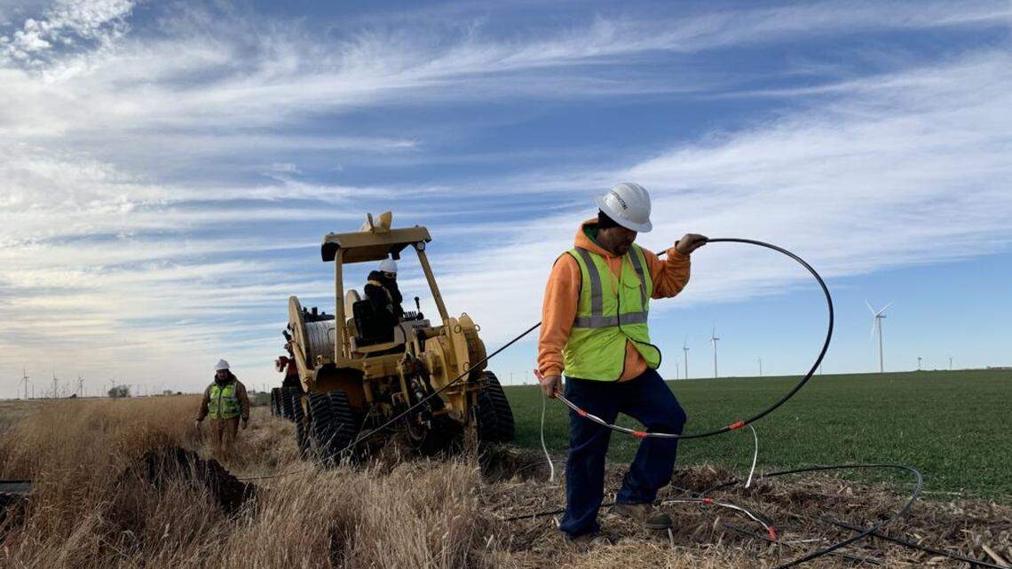 The federal American Rescue Plan Act has resulted in the infusion of millions of dollars to expand broadband access in rural areas across the United States. In this photo, lines are being laid in rural Spearville, Kansas.