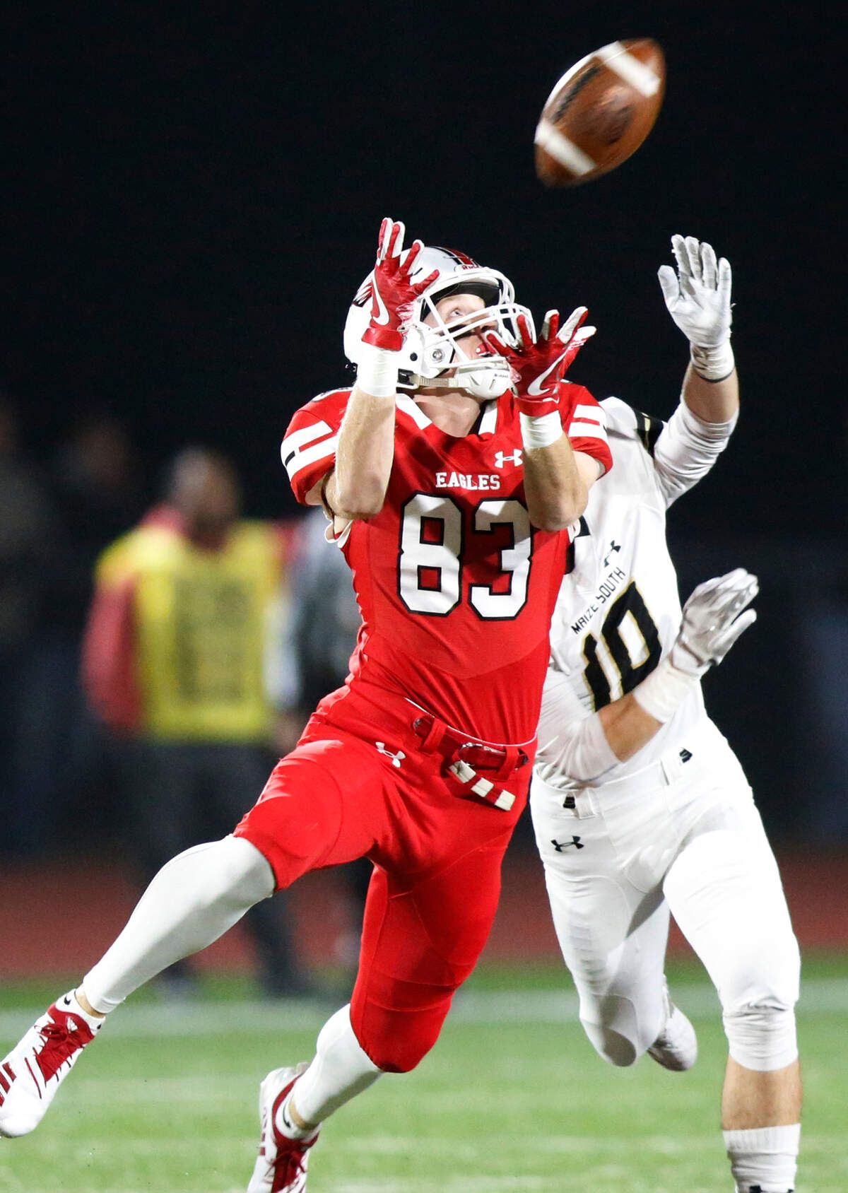 Maize’s Deriq Doty reeled in a pass from Calib Grill Friday night over Maize South defender Tysaac Noland.