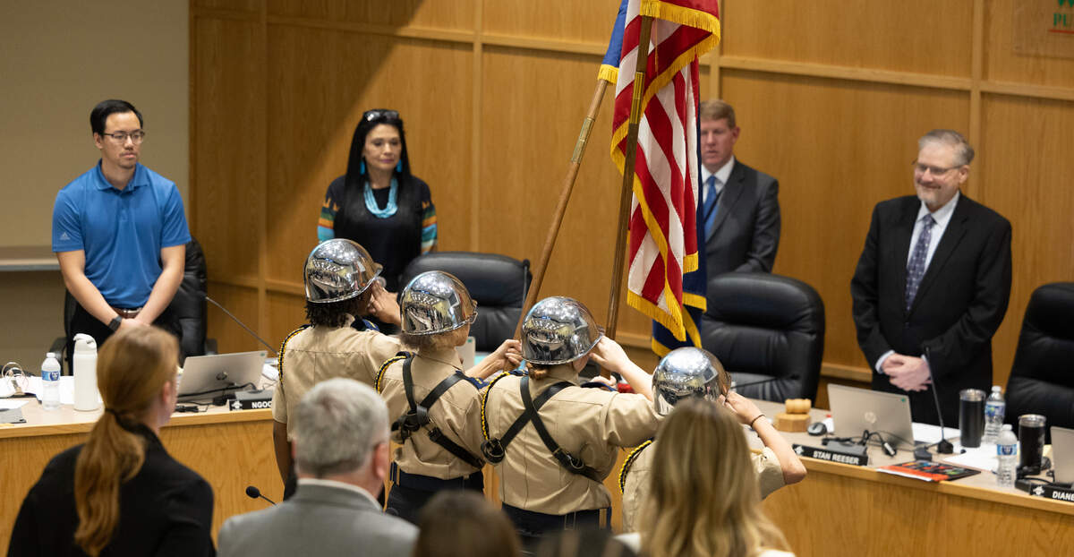 Cadets from the Jardine Middle School JROTC program present the colors before the start of the Wichita school board meeting on Monday night. The board voted to close their school a couple of hours later.