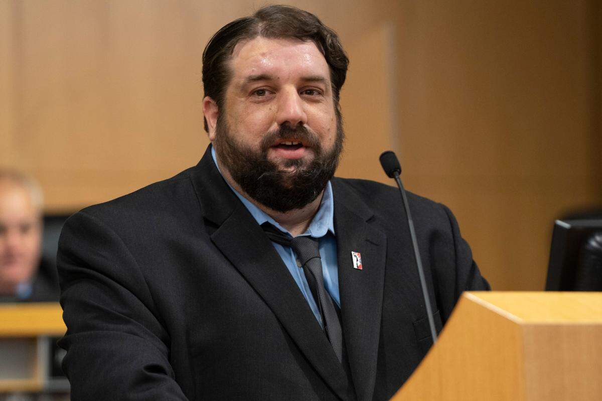 Wichita City Council member Mike Hoheisel speaks to the crowd after being sworn into office. (January 10, 2022)