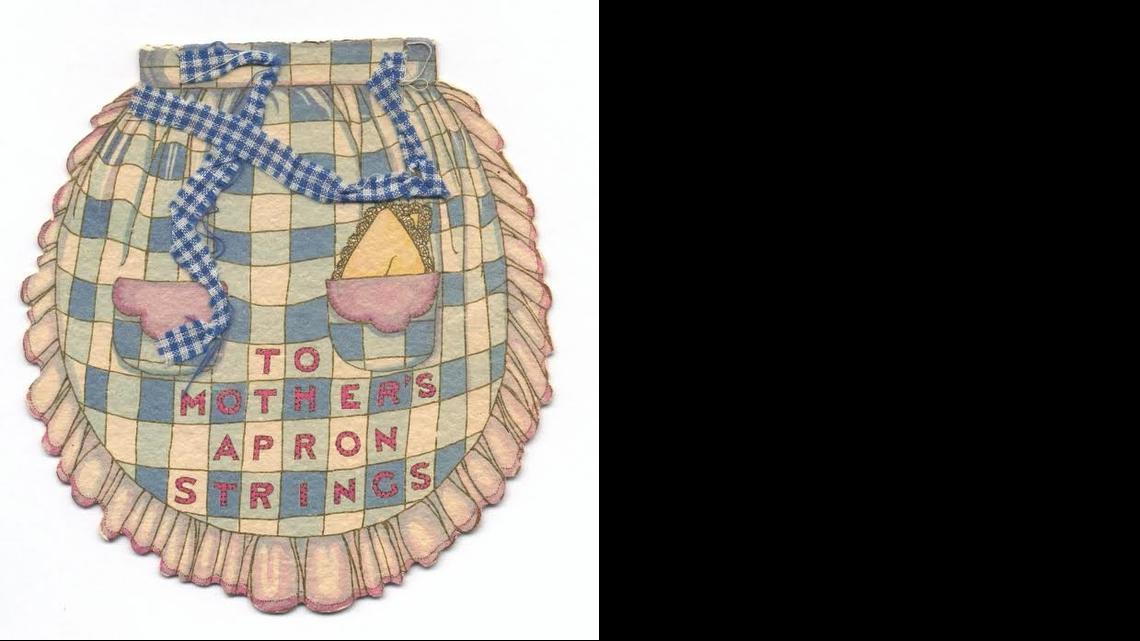 The apron strings on this card from the late 1920s were actual fabric. Such attachments weren’t unusual. Some cards featured lace, tissue paper or pressed dried flowers.

