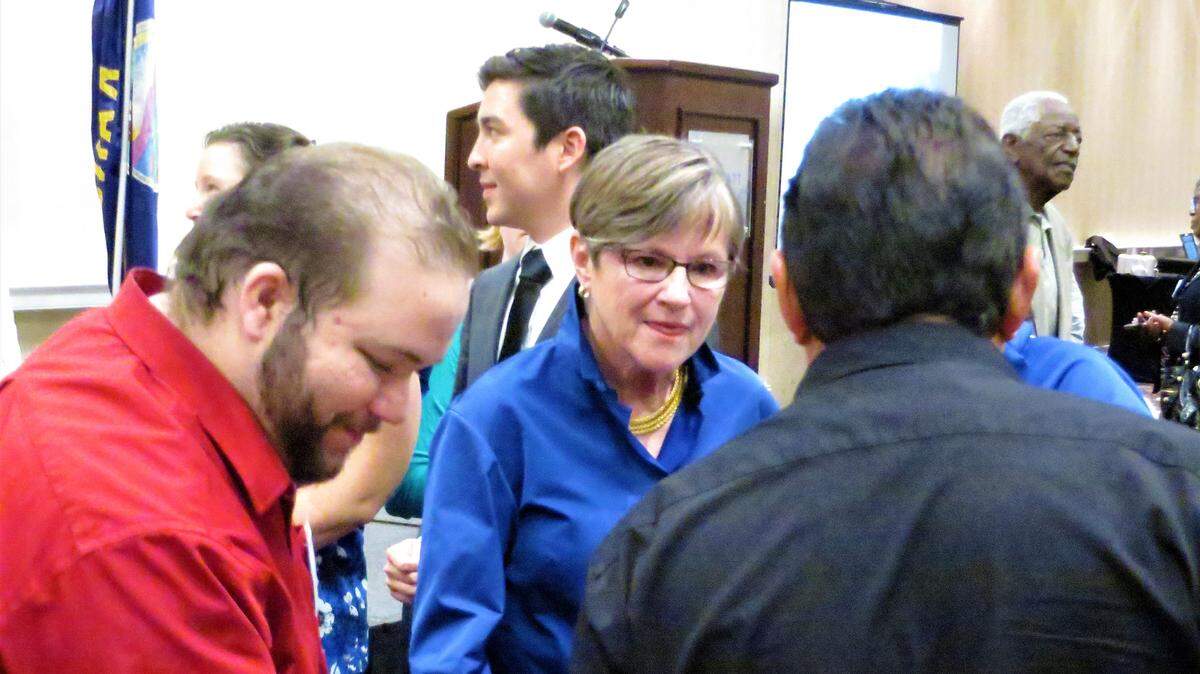 Gov. Laura Kelly greets well-wishers after speaking at the Demofest in Wichita Saturday.