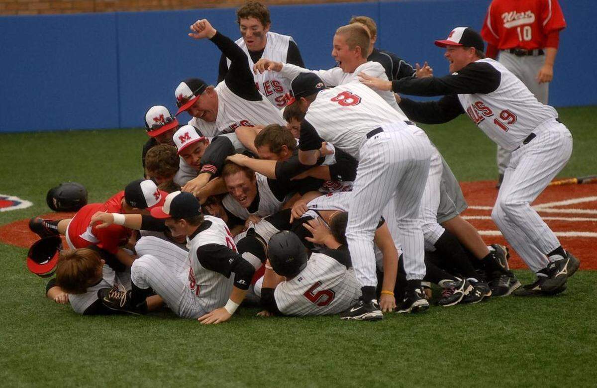 The Maize Eagles celebrate winning the Class 6A baseball tournament in 2011.