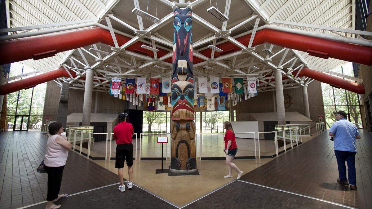 Visitors tour the Mid-America All-Indian Center Tuesday, July 10, 2012. It has been seven years since the City of Wichita took over the operation of the Mid-America All-Indian Center. In that time, changes have been made. The center is now debt free and well on the road to recovery.