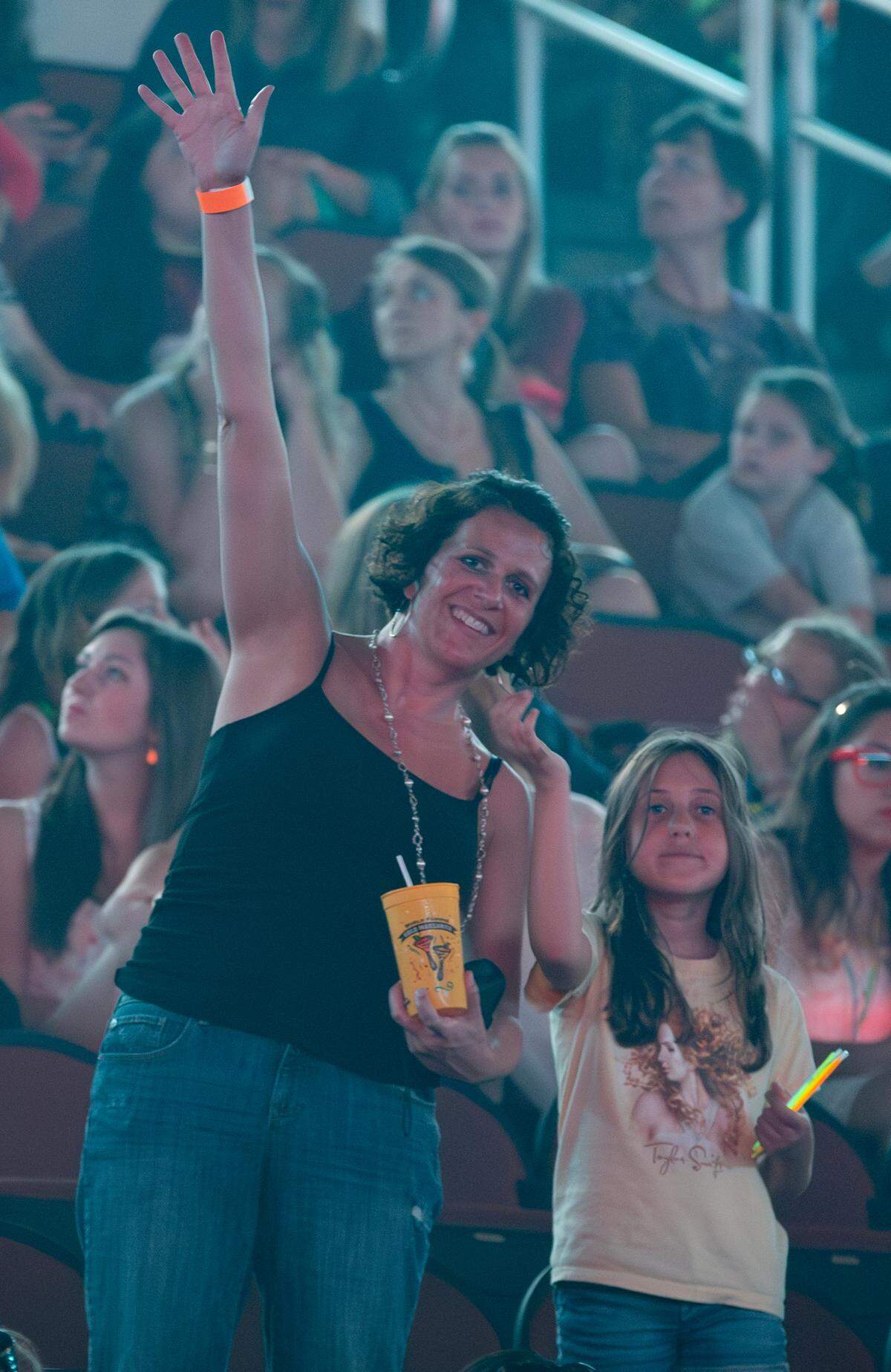 Denise Neil and her daughter, Alexis, at the Taylor Swift concert that hit Intrust Bank Arena in August 2013