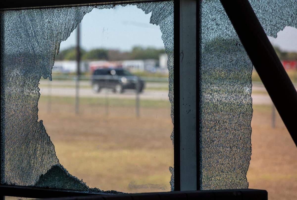 Traffic on Highway 54 can be seen through one of the many broken windows at the Andover YMCA. The building took a direct hit from a tornado on April 29. About 2/3 of the building will be able to be remodeled. The other parts had to be torn down and will be rebuilt.