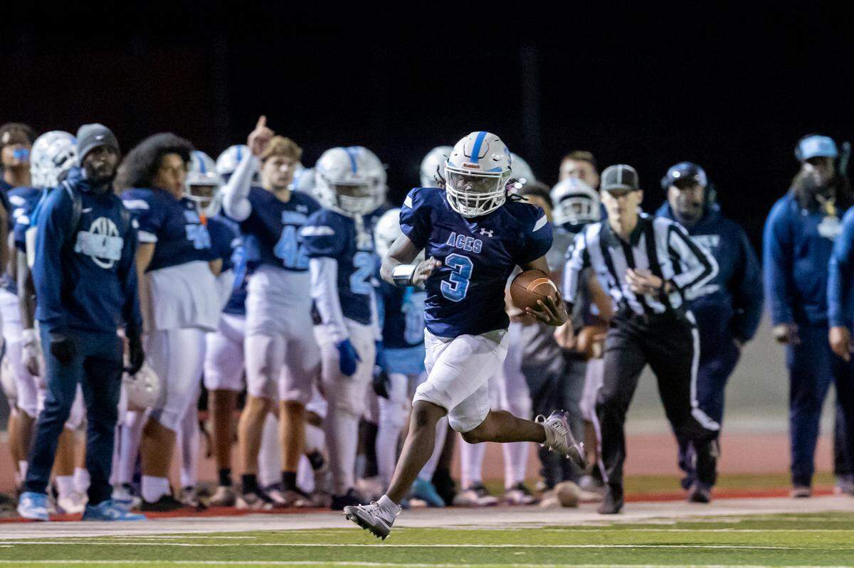 Wichita East running back Duece Bohannon Jr. runs down the sideline in a 63-20 win over Wichita West in Friday’s playoff game.