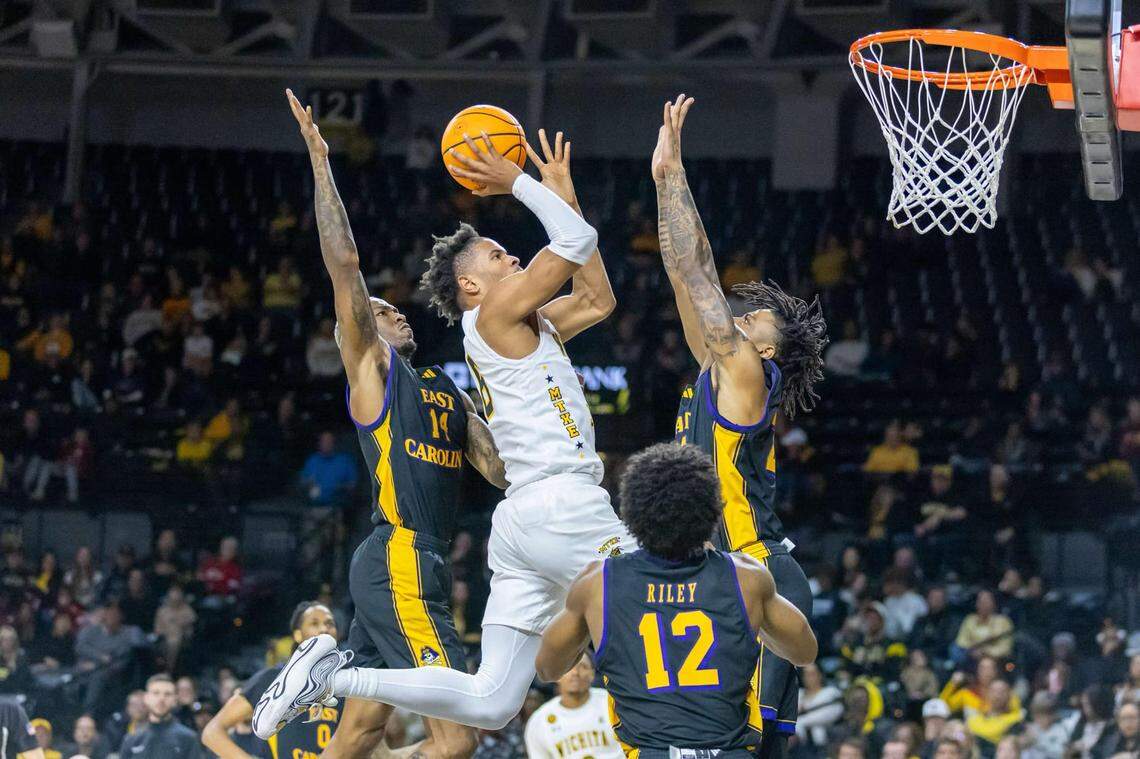 Wichita State’s Corey Washington attacks the basket against East Carolina in a 75-72 loss at Koch Arena on Saturday.