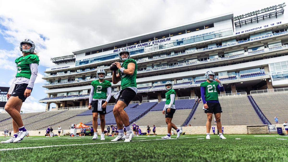 Kansas State quarterbacks (from left) Avery Johnson, Jake Rubley, Will Howard, Adryan Lara and Jacob Knuth practice at Bill Snyder Family Stadium.