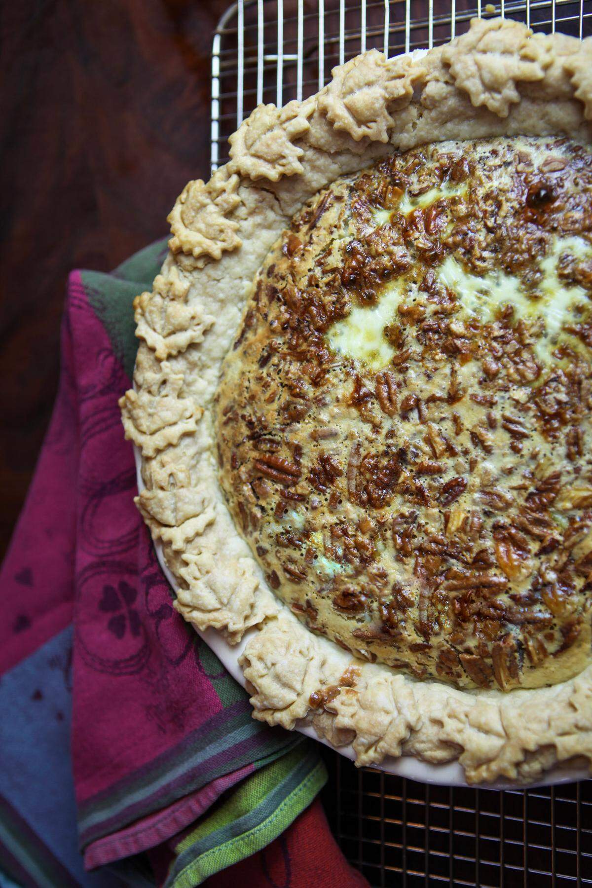 Cream Cheese Pecan Pie is what you’d get if cheesecake and pecan pie had a baby.