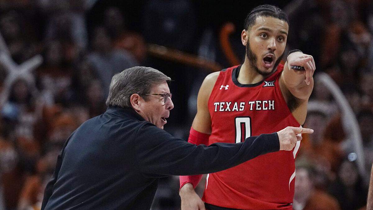 Texas Tech head coach Mark Adams, left, talks with forward Kevin Obanor (0) during the second half of an NCAA college basketball game against Texas in Austin, Texas, Saturday, Jan. 14, 2023. (AP Photo/Eric Gay)
