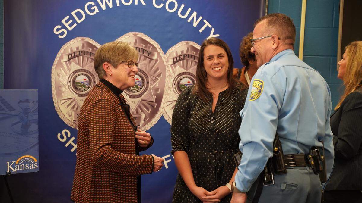 Governor Laura Kelly and Sedgwick County Sheriff Jeff Easter at a roundtable with law enforcement and mental health leaders at the Sedgwick County Jail in October.