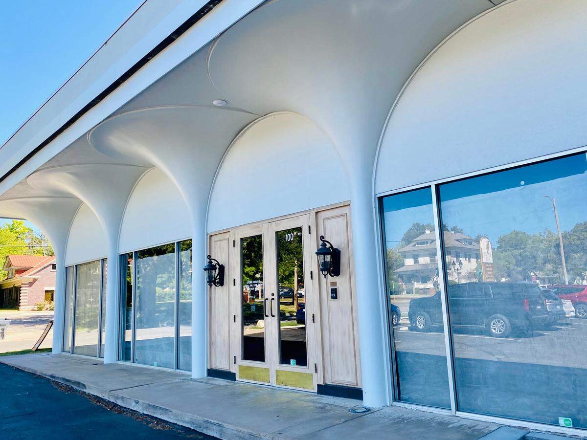 Happiness Plaza’s owners were denied a zoning change request that would have allowed it to build a parking lot behind its business.
