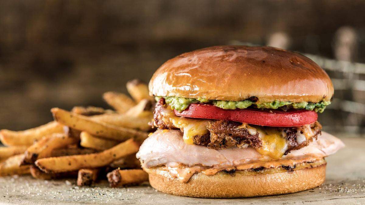 The new Cowboy Chicken on North Rock Road serves rotisserie chicken turned into sandwiches, salads, enchiladas and more.