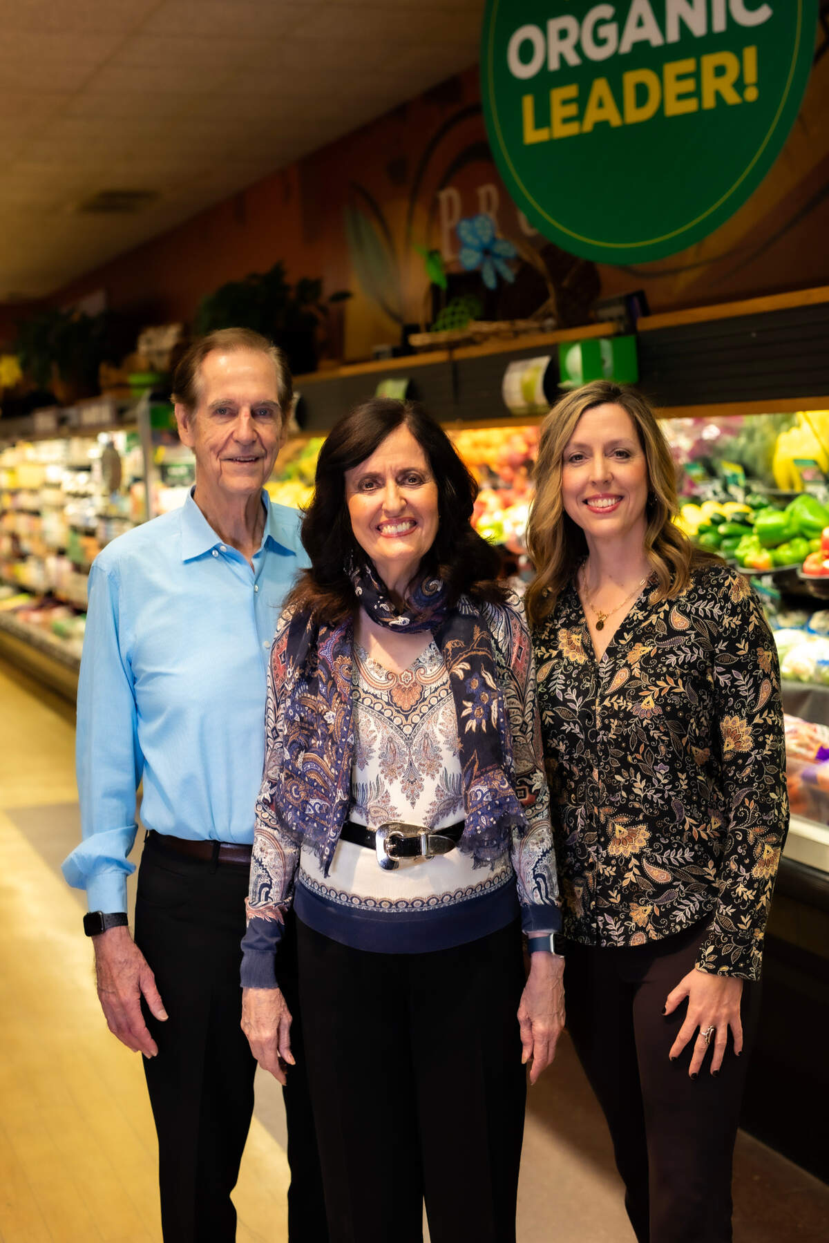 John and Barb Hoffman with their daughter, Shannon, right, have sold their chain of five GreenAcres Market stores to Florida-based Healthier Choices Management. The new company doesn’t plan many changes since GreenAcres is popular as it is.