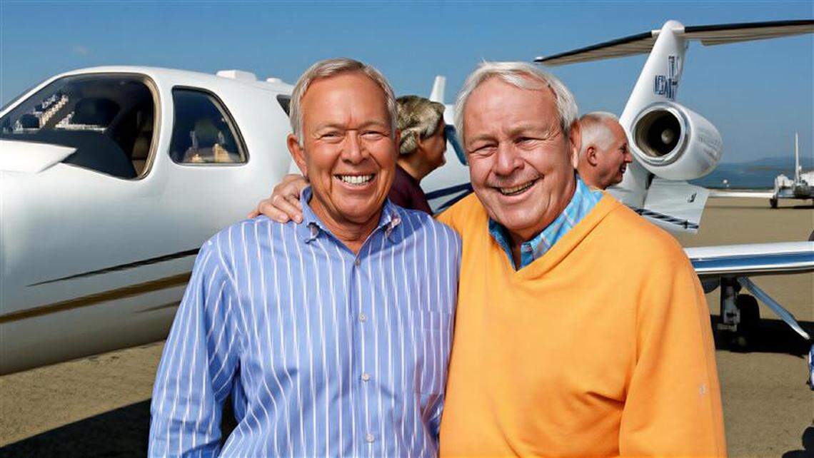 Russ Meyer with golfer Arnold Palmer.