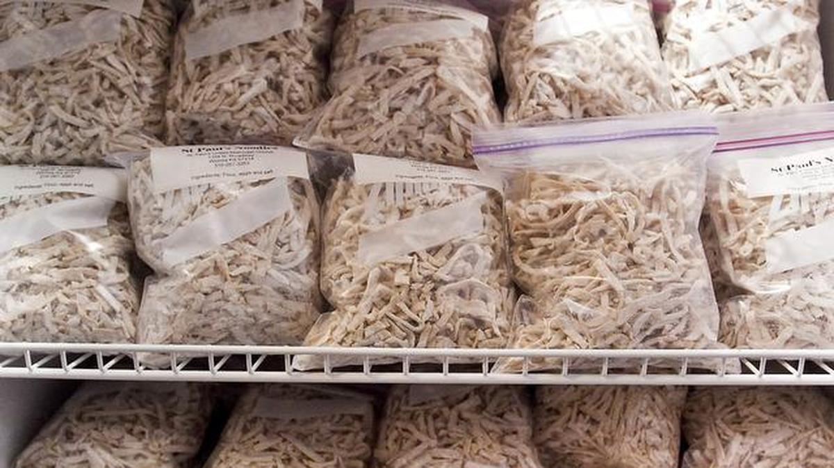 The congregation at St. Paul’s United Methodist Church prepared 1,219 pounds of homemade noodles for their annual dinner.