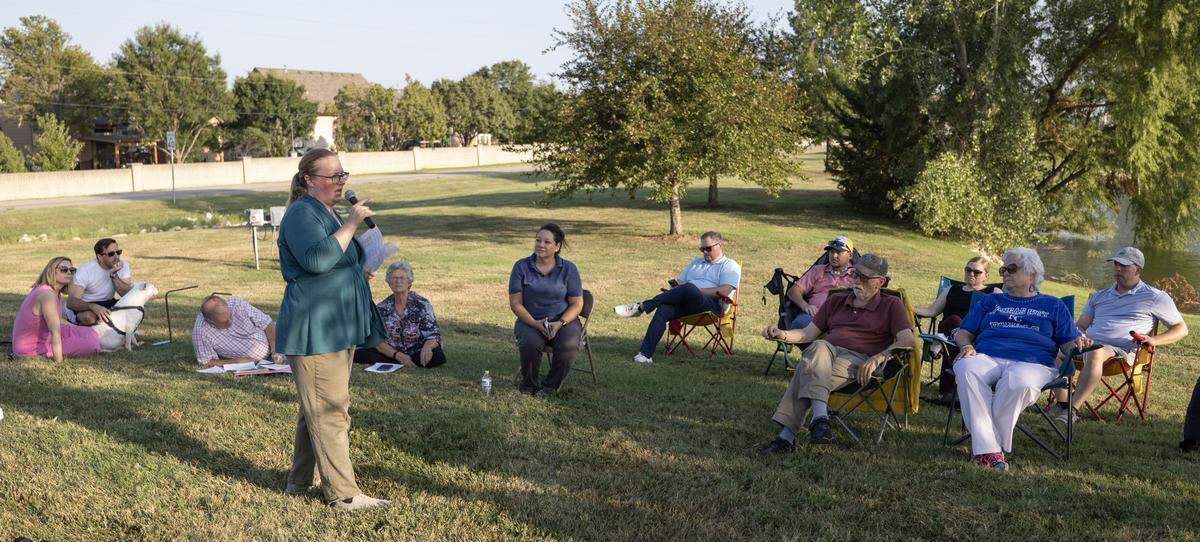 Trish Hileman of Wichita Independent Neighborhoods runs a meeting in the Fairmont neighborhood in northeast Wichita on Monday evening. The neighborhood is preparing for a recall election concerning their the board of directors of their homeowners association.