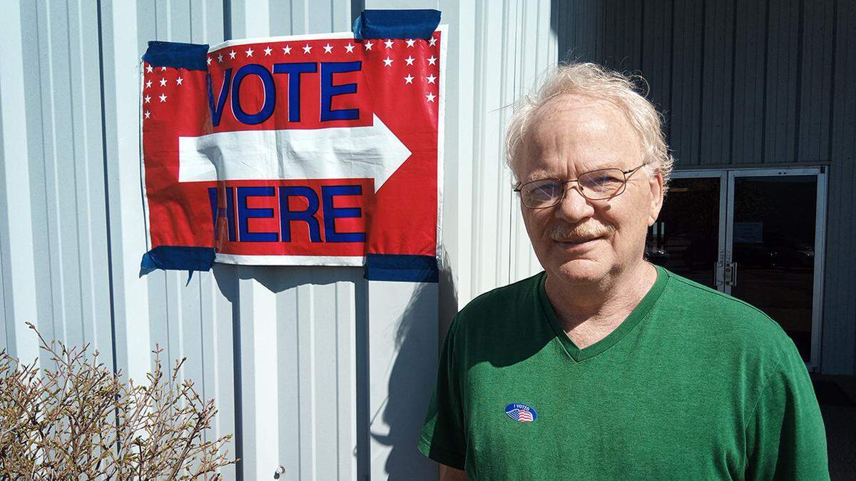 Randall McKinney came out to the Evidence Church polling place to show support for Donald Trump.