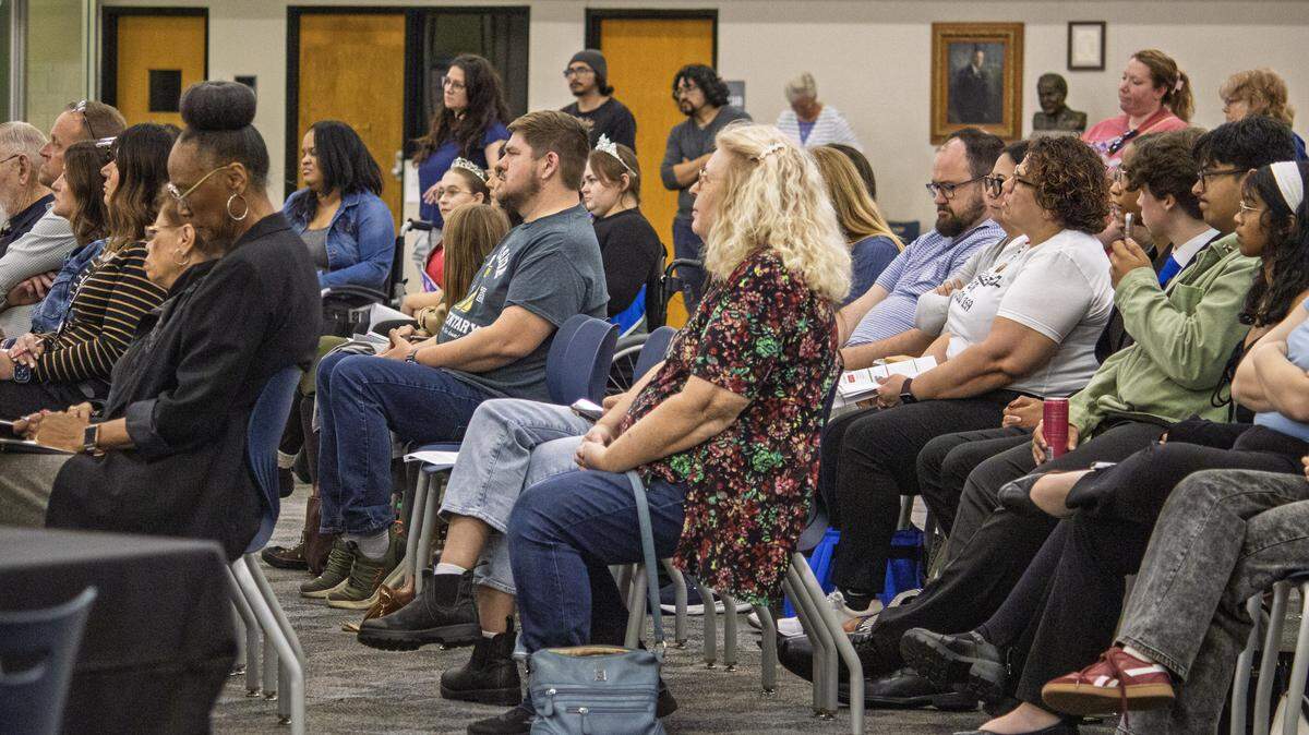 Parents and community members filled the board of education meeting chambers at the Alvin E. Morris Administrative Center on Monday evening ahead of the vote to confirm the closure timeline of four elementary schools.