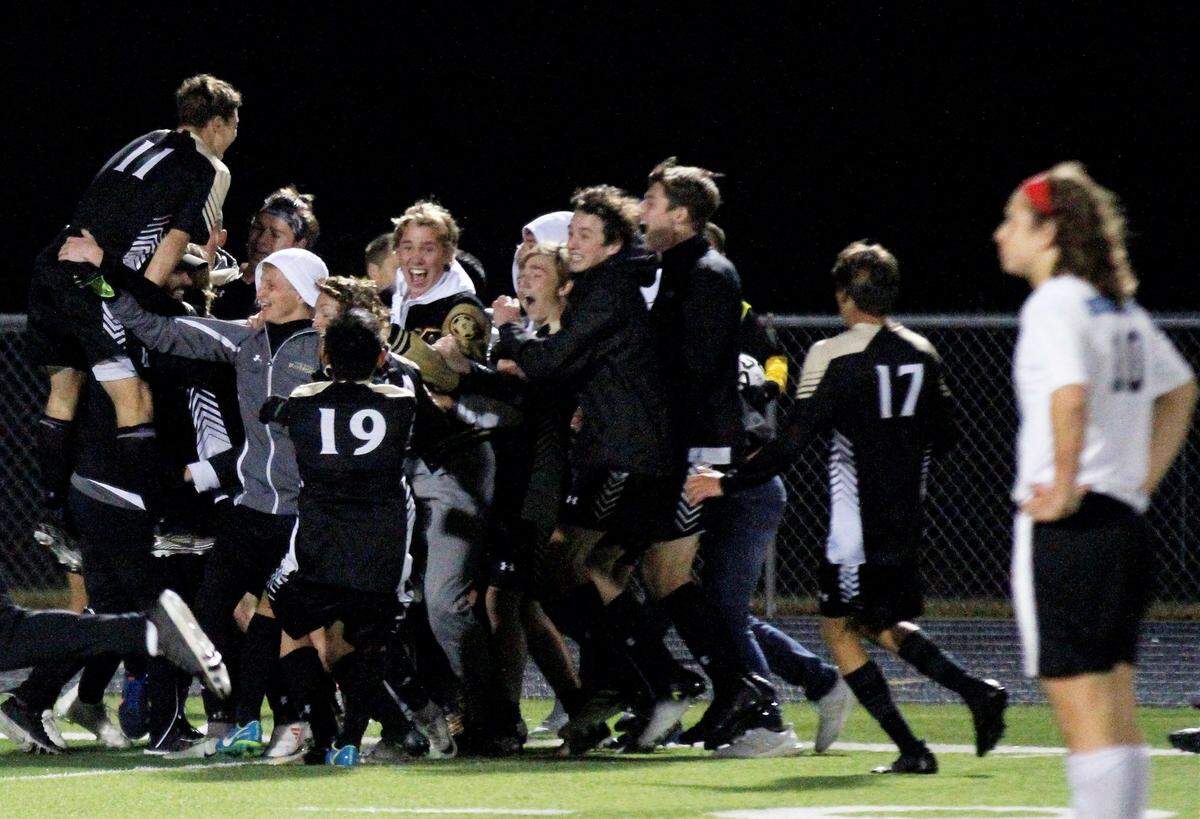 Maize South celebrates its 2018 Kansas Class 5A regional championship win over Eisenhower on Thursday night. (Oct. 25, 2018)