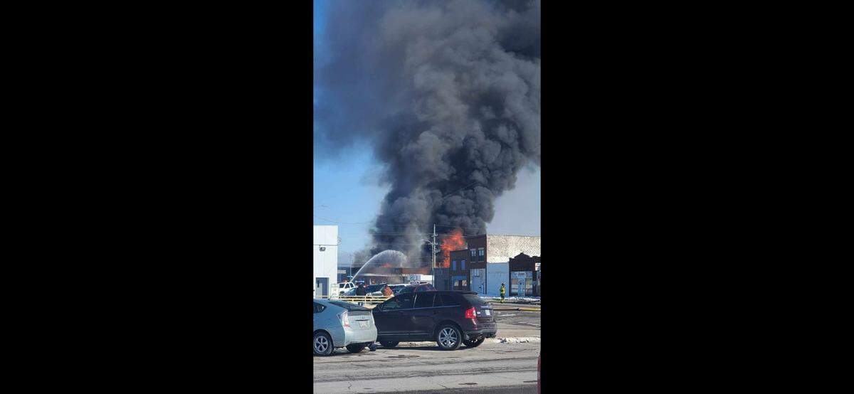 The city of Hutchinson evacuated several blocks Saturday around downtown after a large fire at a building on Main Street.