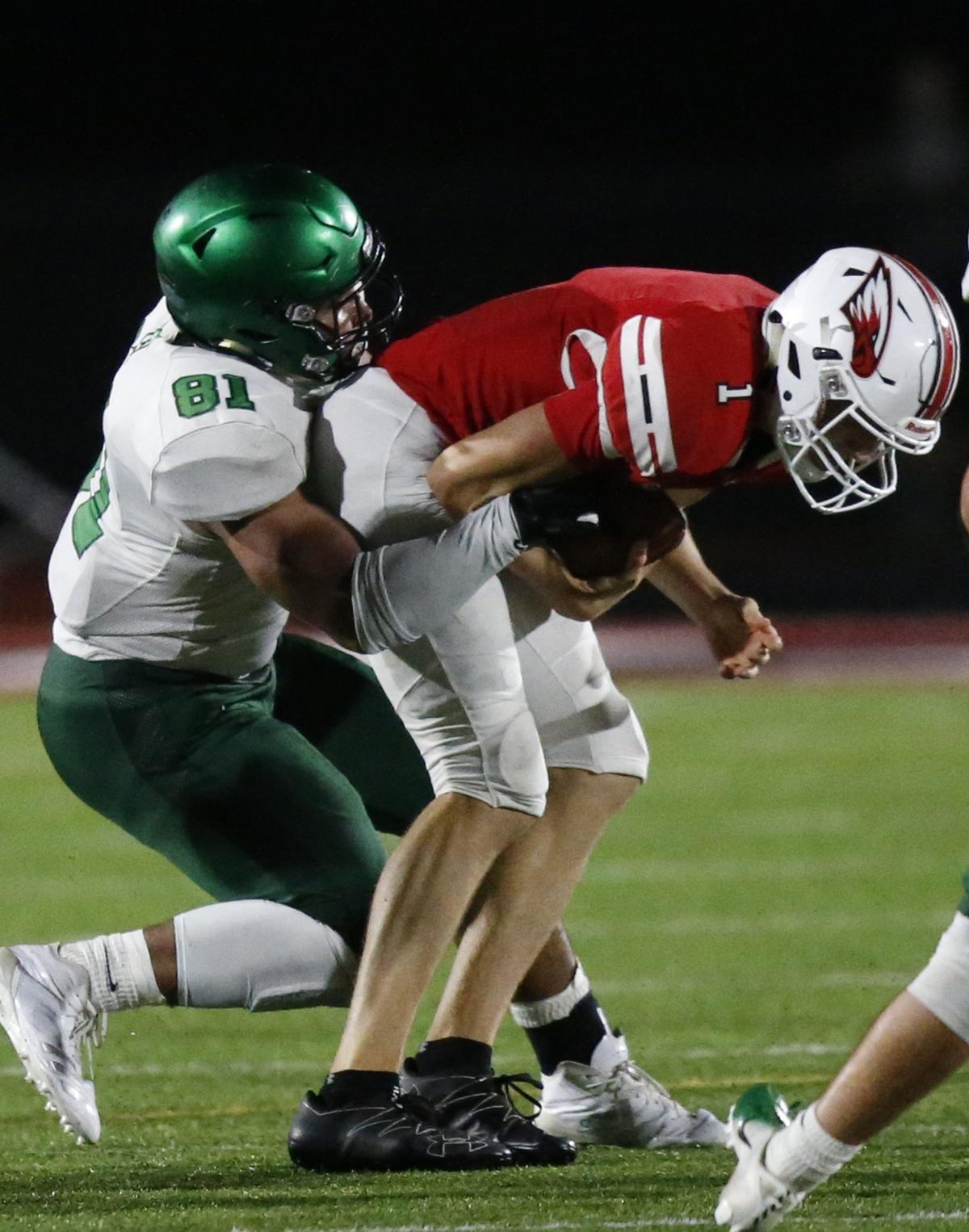 Derby defender #81 Isaac Keener brings down Maize quarterback #1 Caleb Grill for a sack.(October 19, 2018)