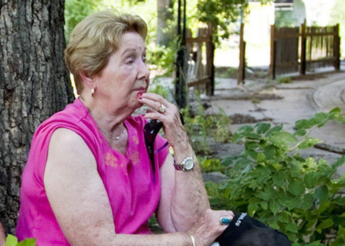 Joyland owner Margaret Nelson Spear is photographed near the park’s entrance in 2012.