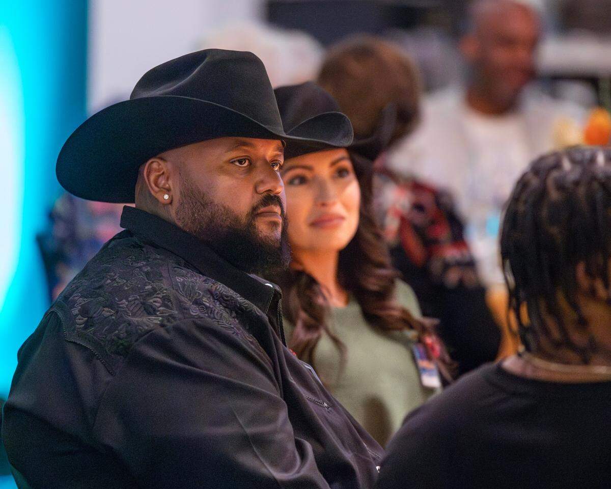 Up-and-coming contemporary artist Robert Peterson and his wife, Marina, attending the opening of his first major museum exhibition that is currently on display at the Wichita Art Museum.