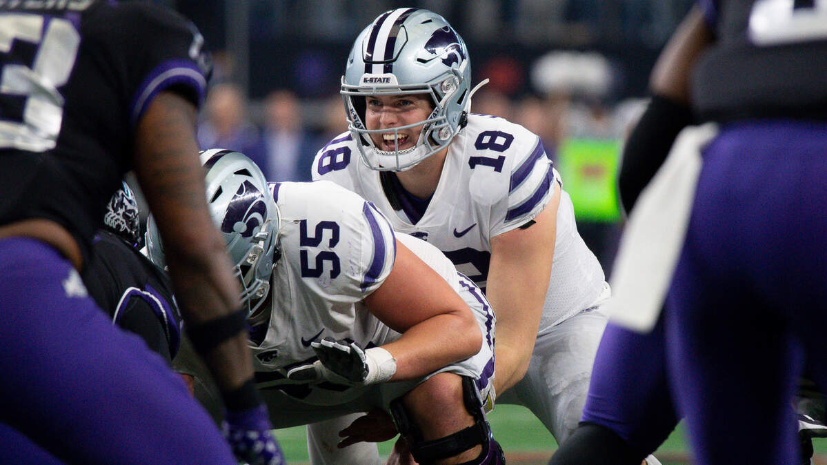 Dec 3, 2022; Arlington, TX, USA; Kansas State Wildcats offensive lineman Hayden Gillum (55) and quarterback Will Howard (18) in action during the game between the TCU Horned Frogs and the Kansas State Wildcats at AT&T Stadium. Mandatory Credit: Jerome Miron-USA TODAY Sports