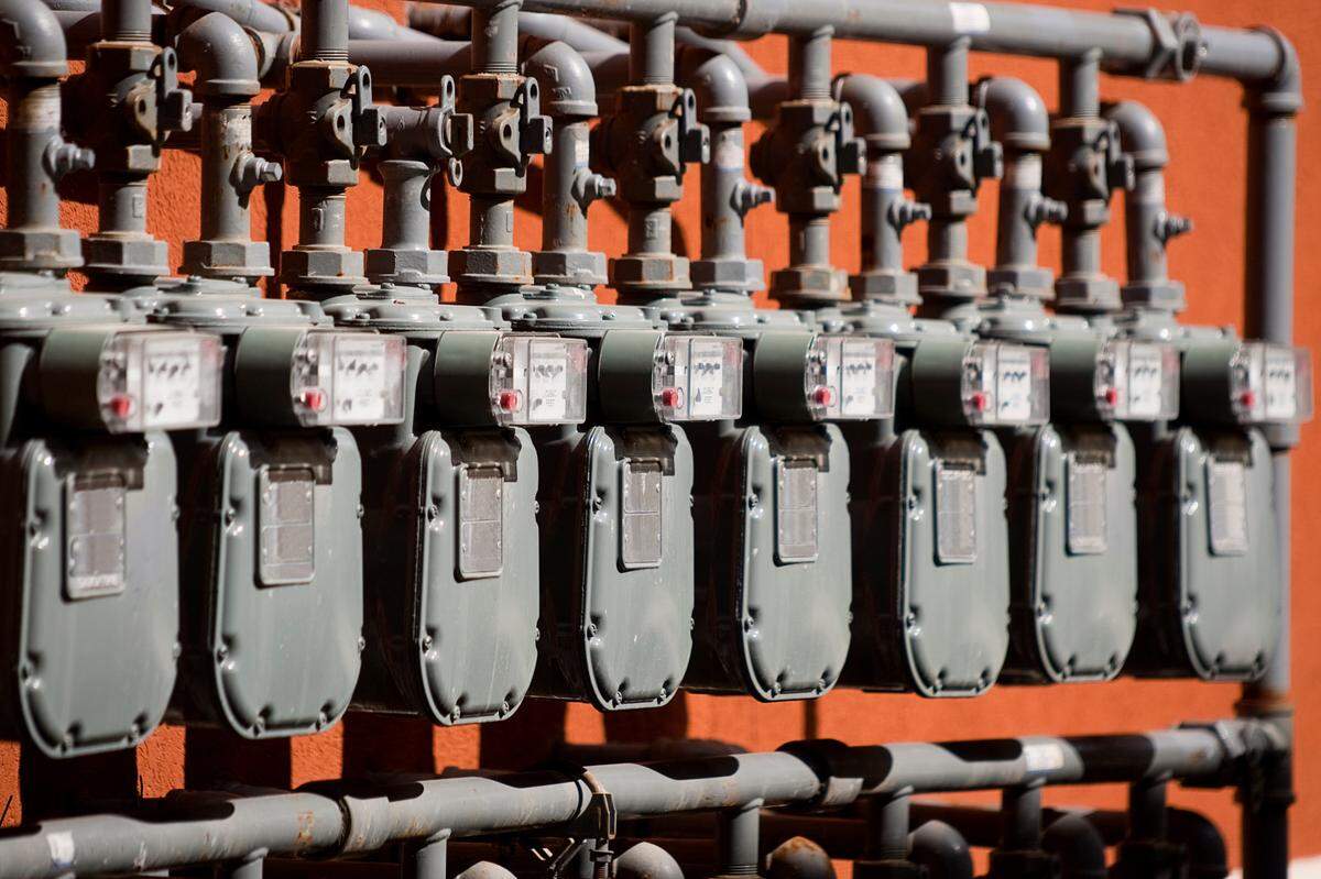 A line up of American style natural gas meters servicing an apartment complex.