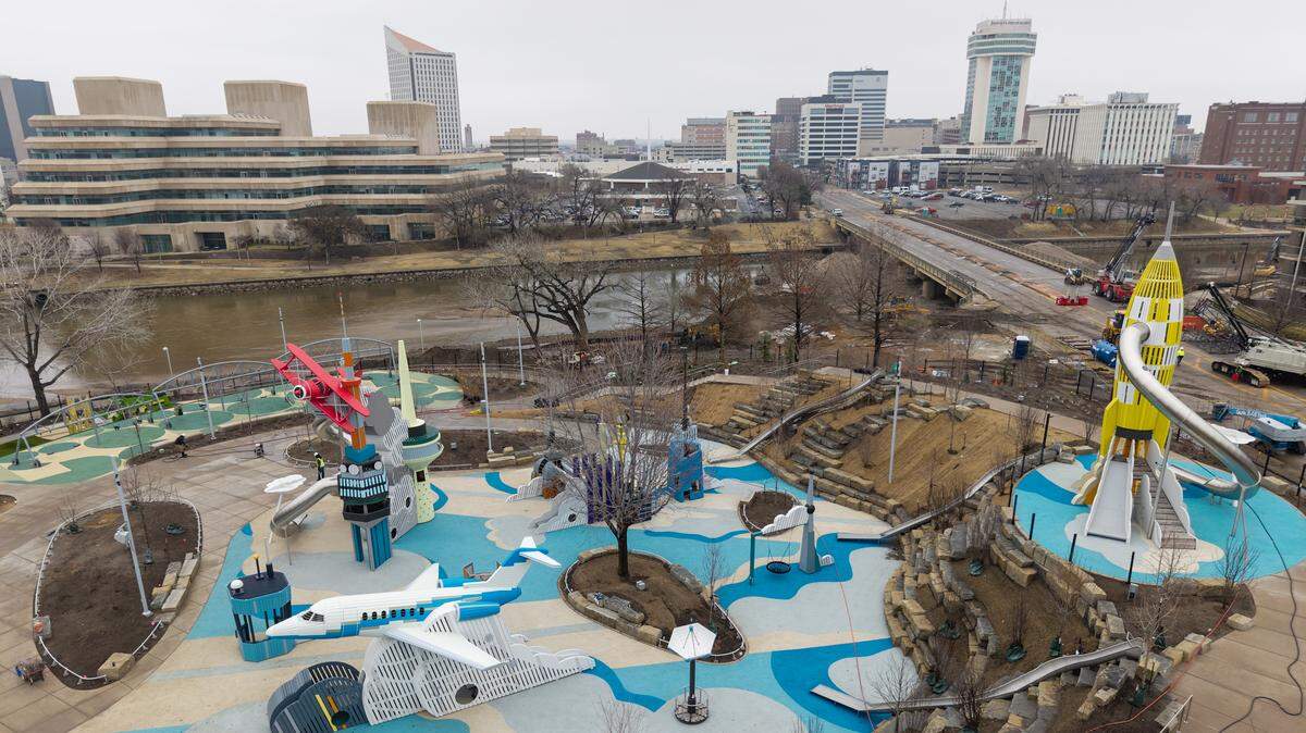The yellow rocket that’s part of Exploration Place’s new Adventure Playscape,visible at top right, has reopened. The red biplane, pictured on the left of this frame, needs a few more days before it will be repaired, the museum’s president said on Monday.