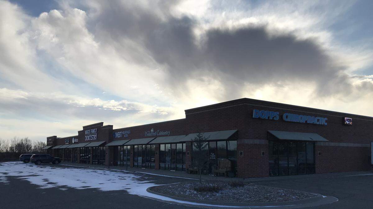 Chiropractor Ian Dopps now owns this building at 45th and Maize Road and is renaming it Eagle Point Health to go with the health-related theme he has for all the businesses there.