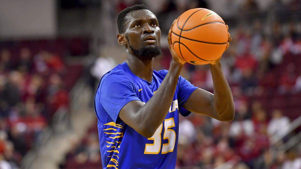 Hofstra forward Abayomi Iyiola (35) shoots a free throw against Arkansas during the second half of an NCAA college basketball game Saturday, Dec. 18, 2021, in Little Rock, Ark. (AP Photo/Michael Woods)
