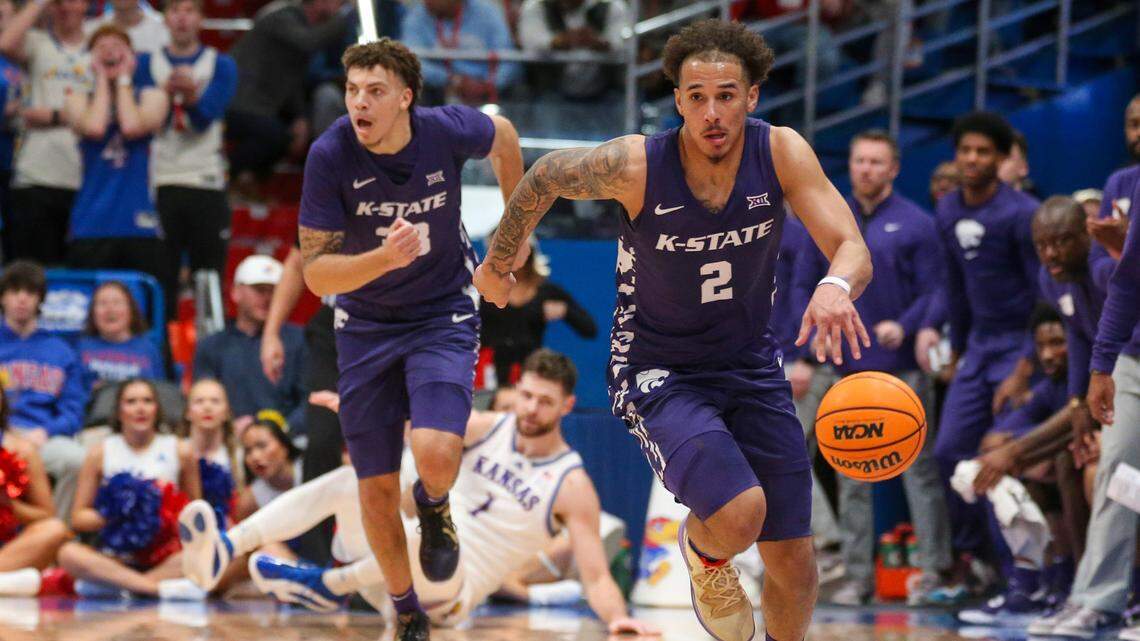 Kansas State Wildcats guard Max Jones (2) brings the ball up court during the first half against the Kansas Jayhawks at Allen Fieldhouse.