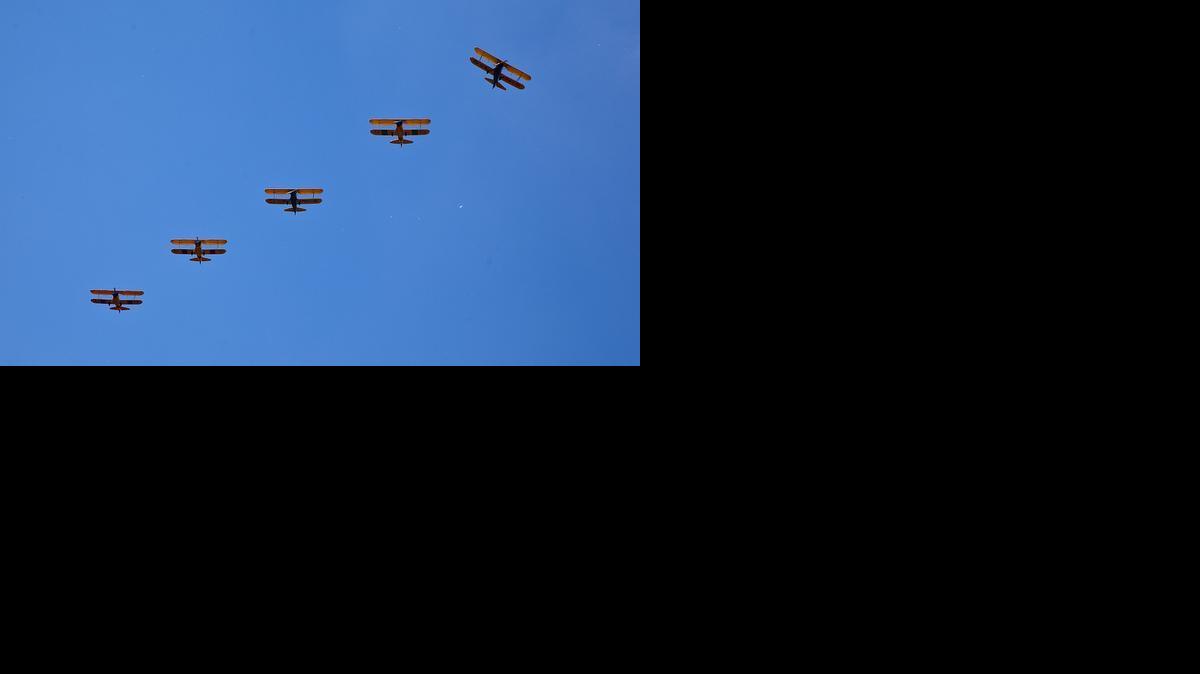 Owners of historic Stearman biplanes gathered at a private Goddard landing strip for lunch Friday during this weekend’s Stearman fly-in at the Lloyd Stearman Airport in Benton. Pilots flew in from as far away as California, Texas and Iowa to join local pilots. (May 30, 2014)


