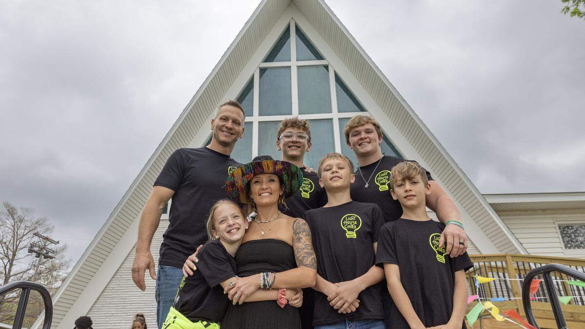 Chiropractors Joey and Devin Vrana, pictured with their children, have moved her LightHouse practice to a former church near Central and Tyler where she also plans to create something of a west-side Clifton Square. 