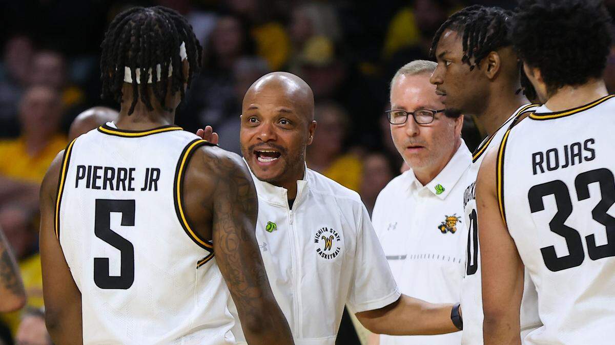 Wichita State men’s basketball coach Isaac Brown instructs his players during a timeout this season. The Shockers have struggled mightily with turnovers lately entering Thursday’s road game at Temple.