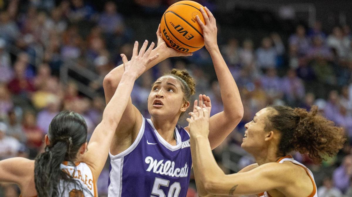 Kansas State Wildcats center Ayoka Lee attempts a shot against Texas during Monday afternoon’s Big 12 women’s basketball tournament semifinal game at T-Mobile Center in Kansas City.