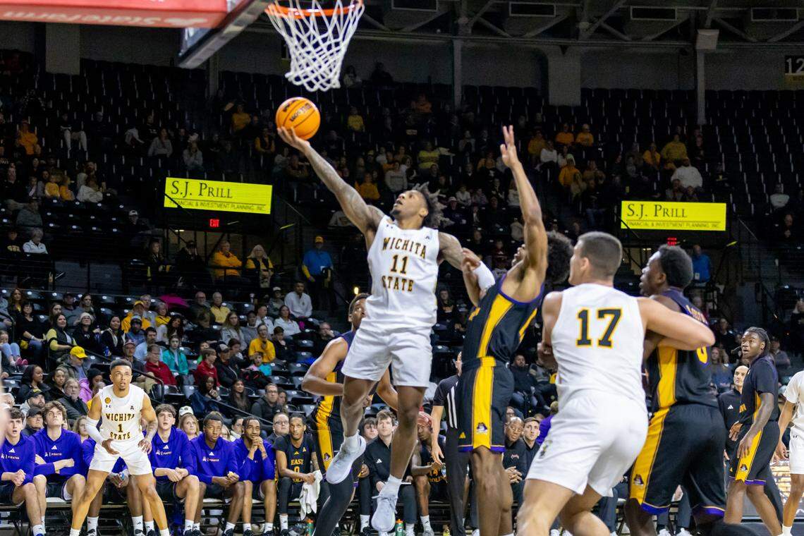Wichita State’s Justin Hill scores a layup in the first half against East Carolina in Saturday’s game at Koch Arena.