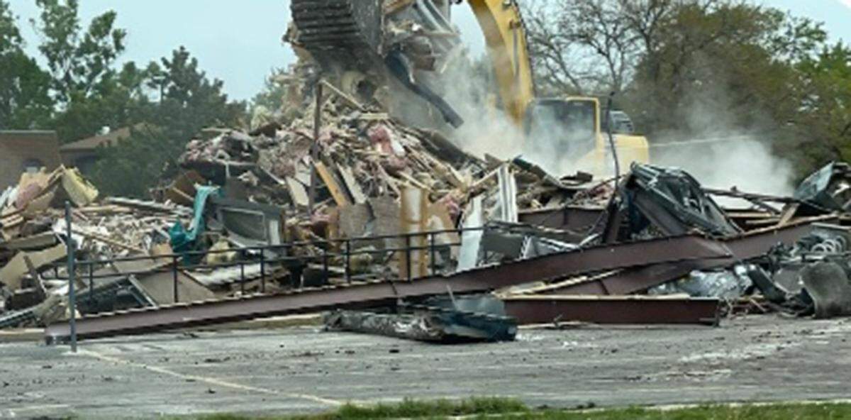 The longtime building where Hen Feathers and a few other businesses used to be was demolished to make way for a new 7 Brew Coffee at Douglas and Rock.