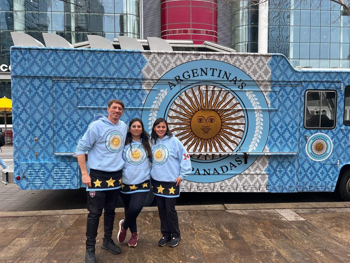 Argentina’s Emanadas owners Chad Freeman, left, and Carolina Brandan, center, took third place on the last season of Food Network’s “The Great Food Truck Race.” Paola Mentis, right, the owner of Kónkeh Artisan Alfajor Pastries in Wichita, was part of their team.