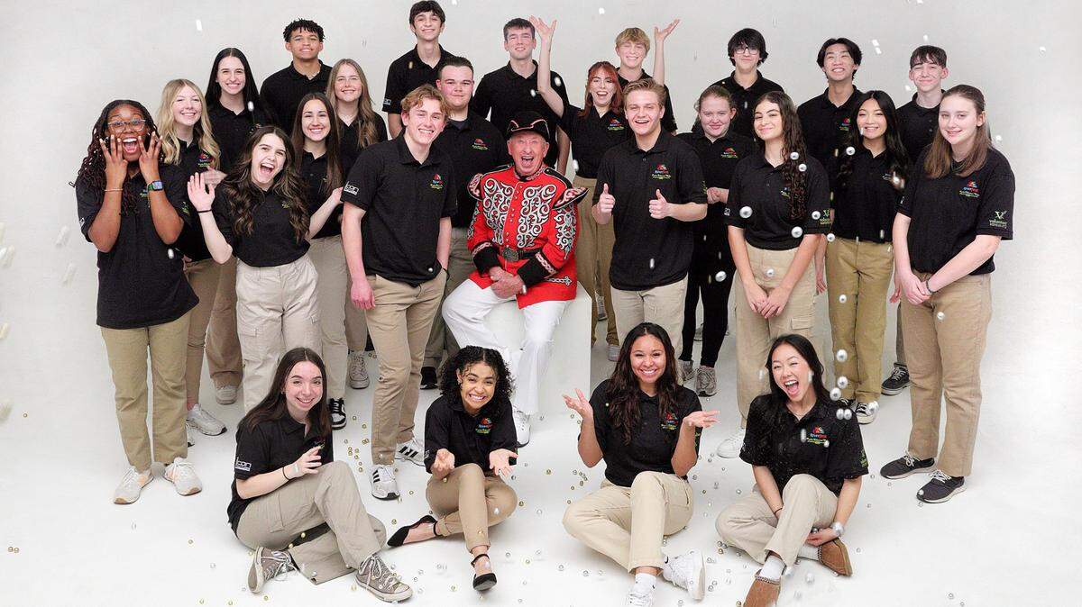 Admiral WIndwagon Smith for the 2024 Wichita Riverfest, Lyle Schuette, center, is pictured with most of the high school-age helpers chosen to serve with him as “Prairie Schooner Mates.”