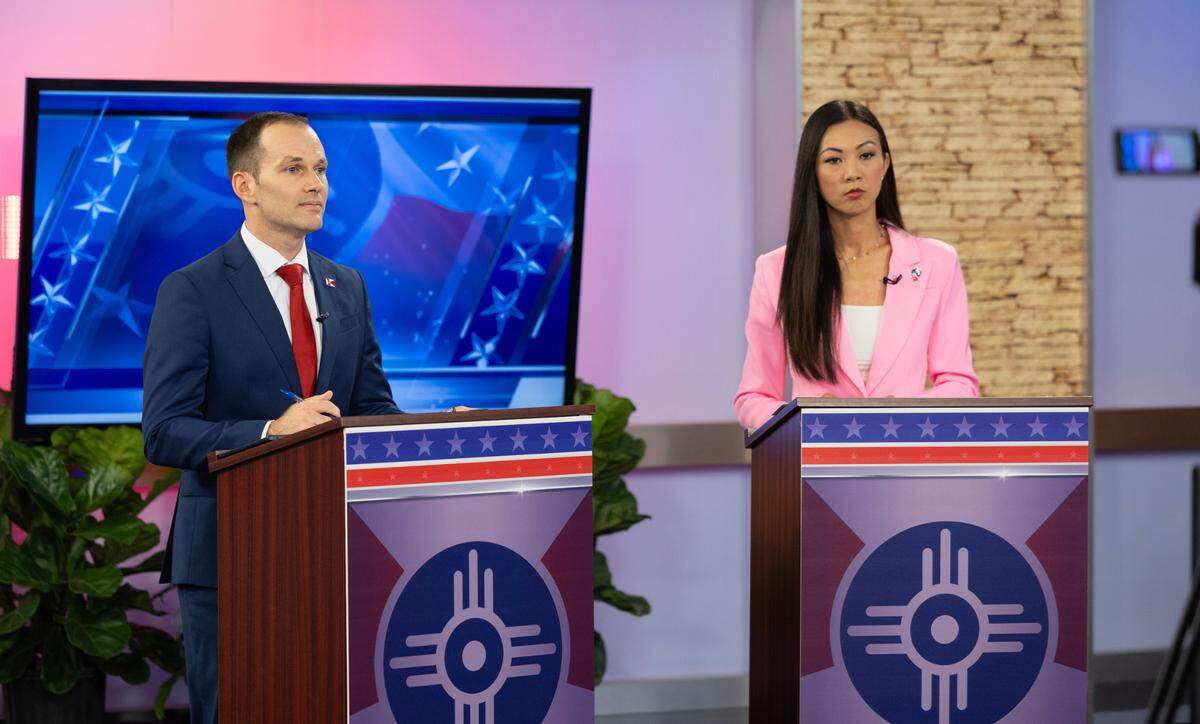 Brandon Whipple and Lily Wu take part in a debate at the KAKE news studio on Tuesday. The election that will decide Wichita’s next mayor is Nov. 7.