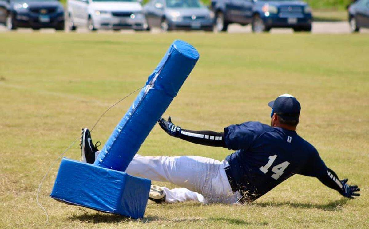In beep baseball, runners have to try to run toward four-foot padded cylinders 90 feet away to score a run before the defense corrals the ball.