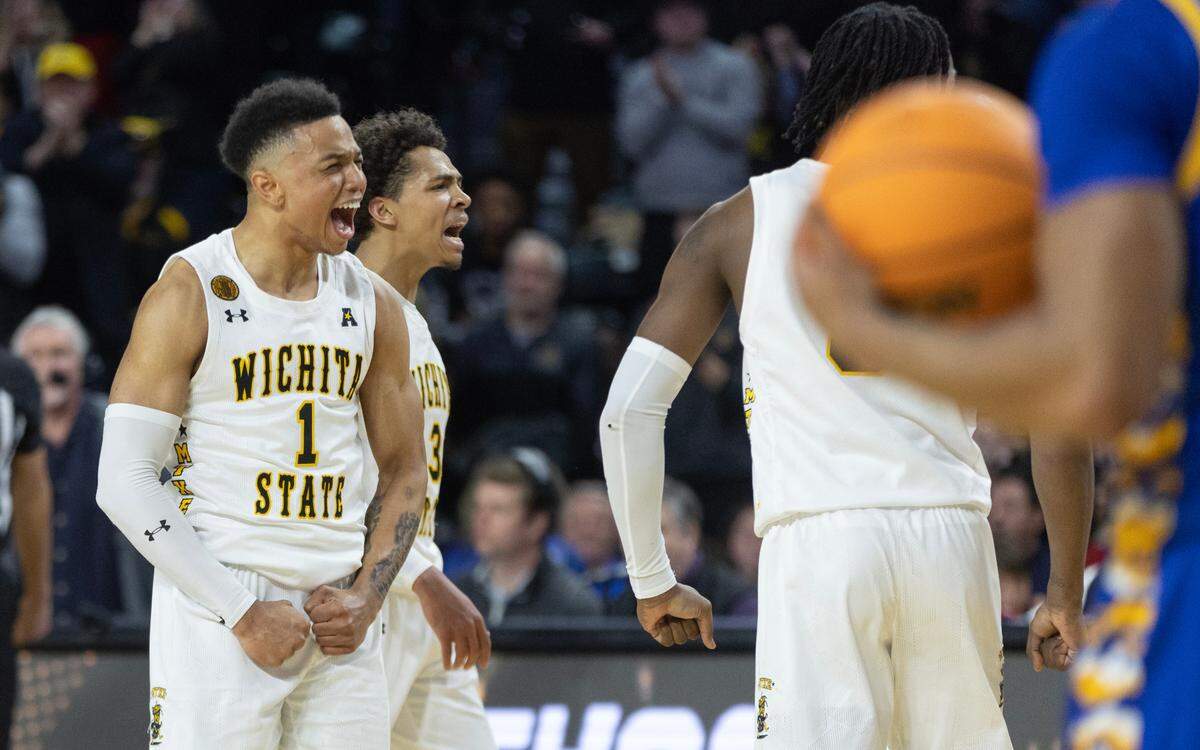 Wichita State’s Xavier Bell celebrates the Shockers taking their first lead of the game late in the second half against Tulsa on Saturday.