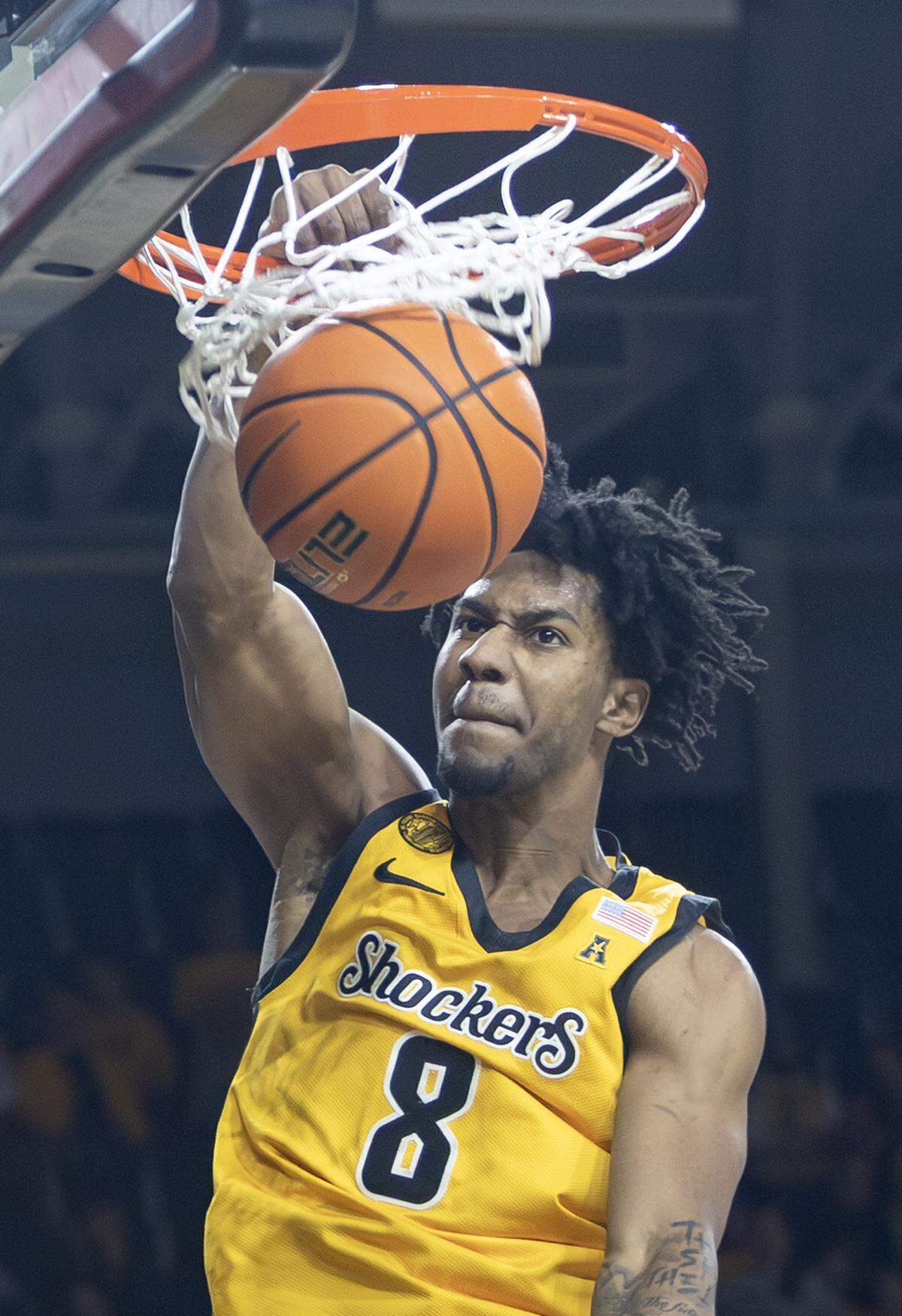 Wichita State’s Dillon Battie dunks the ball against Memphis during the first half at Koch Arena on Saturday.